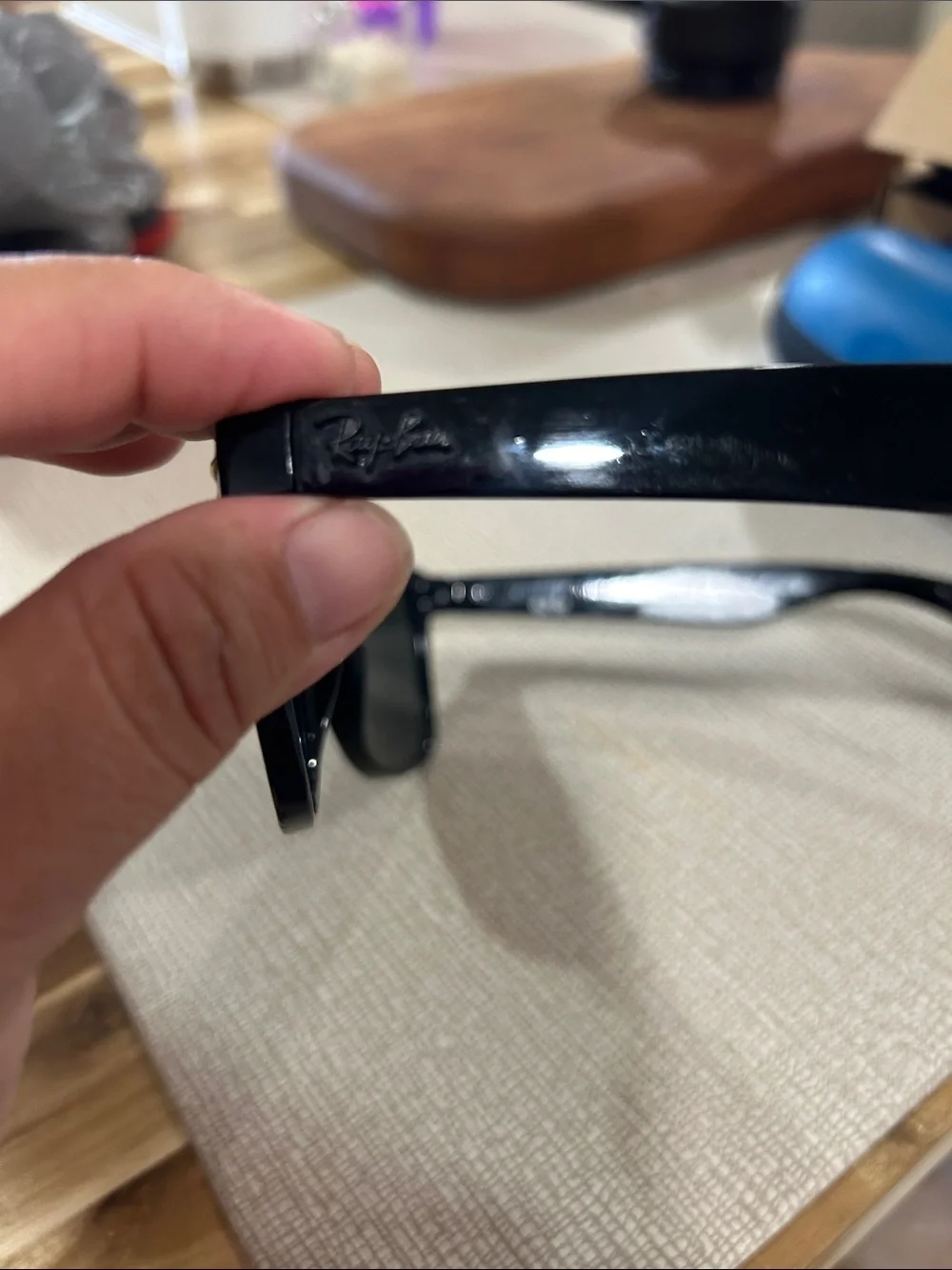 Ray-Ban Black Frame Sunglasses with Blue-Purple Mirrored Lenses